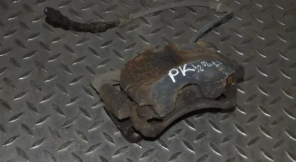 Volkswagen Golf VII Front brake caliper