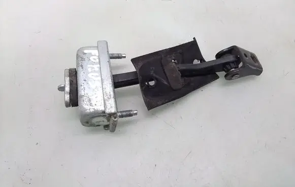 Front door check strap stopper