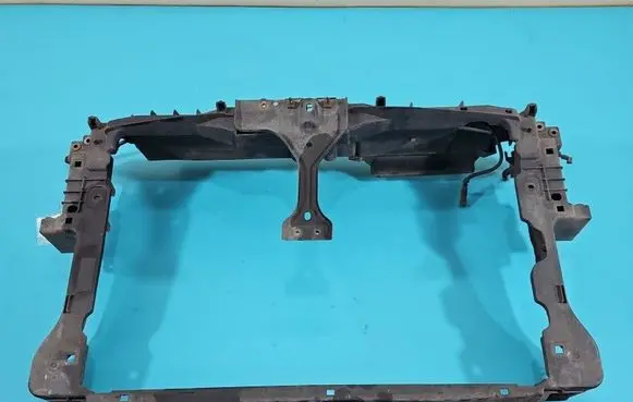 Radiator support slam panel