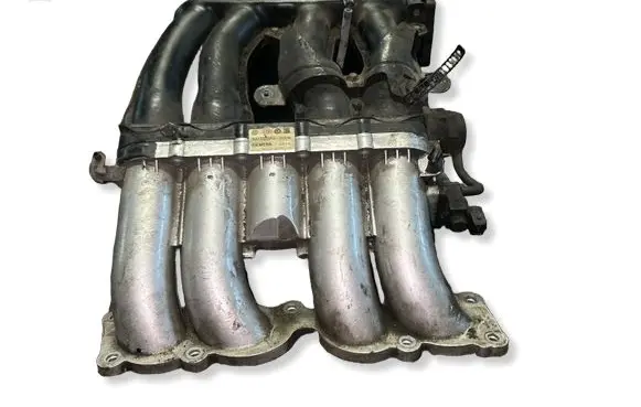 Volkswagen Golf IV Intake manifold 06A133203AG