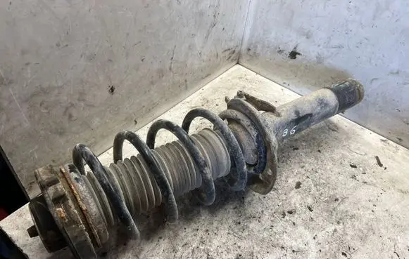 Volkswagen PASSAT B6 Front shock absorber with coil spring
