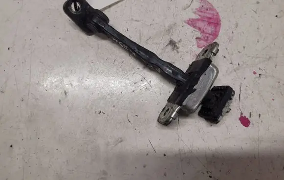 Front door check strap stopper