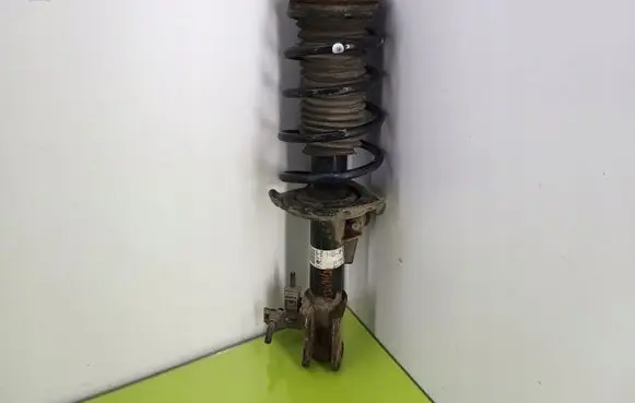 Opel Astra G Front shock absorber with coil spring 22203710