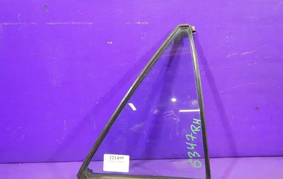 Mazda 323 Front door window glass four-door