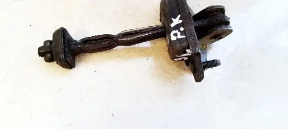 Front door check strap stopper
