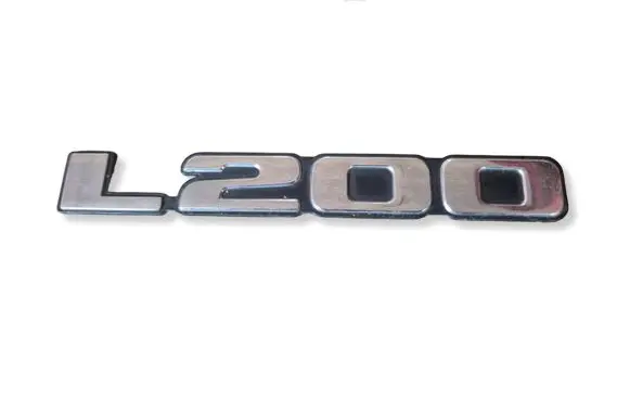 Mitsubishi L200 Front door emblem/model letters 