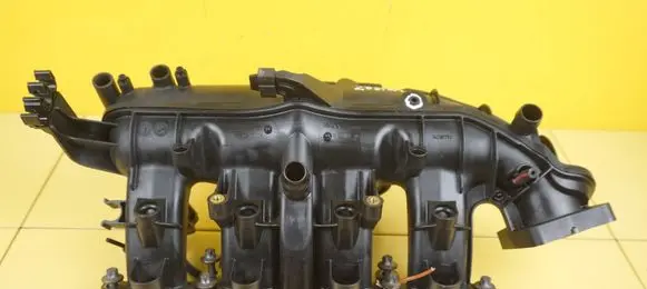 Opel Astra J Intake manifold 55573171 A14NEL