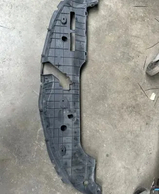 Engine bonnet/hood lock trim molding