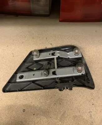 Mercedes-Benz E W124 Tail light bulb cover holder