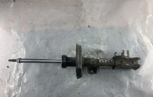 Opel Corsa D Front shock absorber/damper 13214358 GP27385