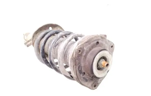 Volkswagen Caddy Front shock absorber with coil spring