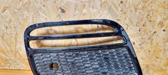 Rear bumper trim bar molding
