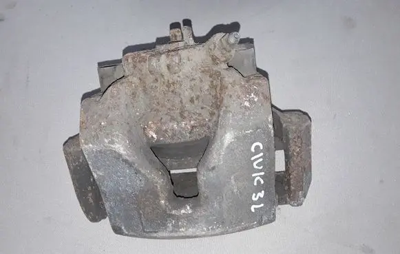 Honda Civic IX Front brake caliper 