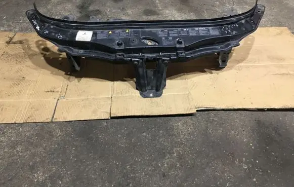 Top upper radiator support slam panel