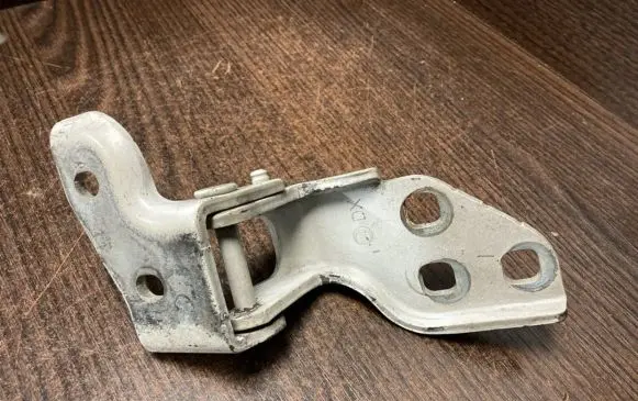 Front door lower hinge
