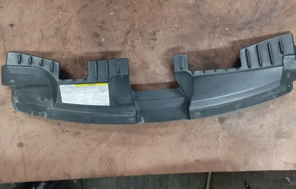 Top upper radiator support slam panel