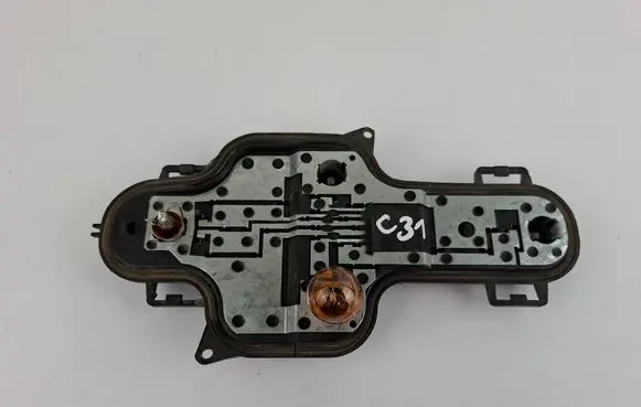 Nissan Primera Tail light bulb cover holder 89024270