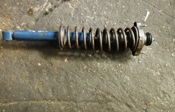 Mitsubishi Space Star Rear shock absorber with coil spring 