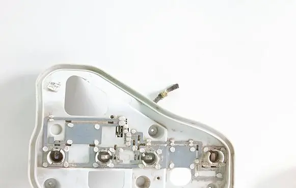 Tail light bulb cover holder