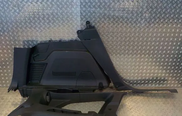Trunk/boot lower side trim panel