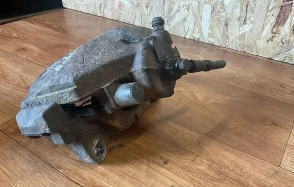 Volkswagen Caddy Front brake caliper 1K0615124E