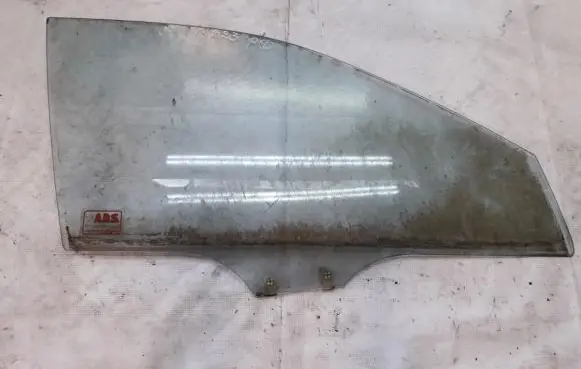 Mazda 323 Front door window glass four-door
