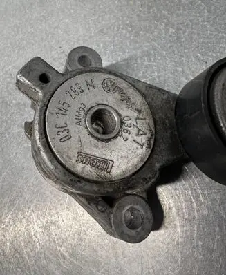Volkswagen Golf Plus Generator/alternator belt tensioner 03C145299M