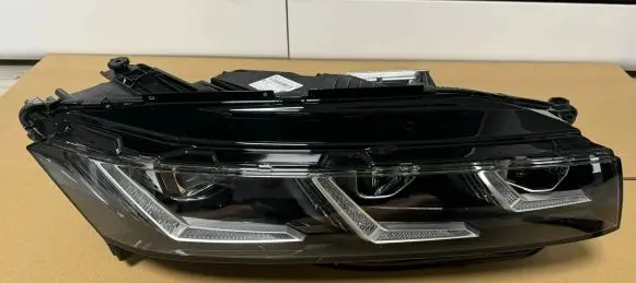 Volkswagen Touareg III Headlight/headlamp 761941082B 030113023200