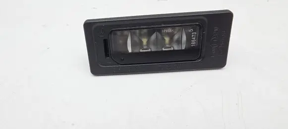 Volkswagen Touran II Number plate light 3AF943021