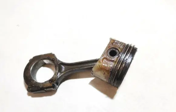 Piston with connecting rod
