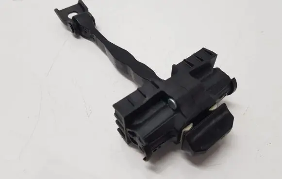 Front door check strap stopper