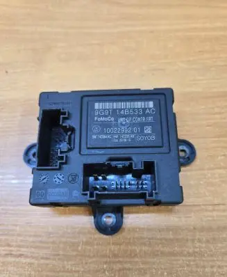 Volvo V70 Door control unit/module 9G9T14B533AC 1002299201