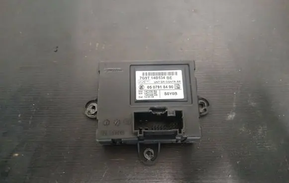 Volvo V70 Door control unit/module 7G9T14B534BE 0507918400