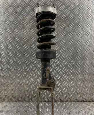 Volkswagen Touareg II Front shock absorber with coil spring 