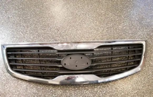 KIA Sportage Front bumper upper radiator grill 863523W000