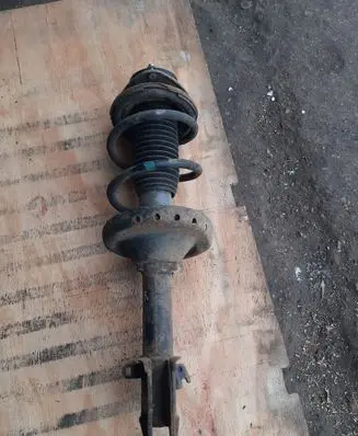 Subaru Outback Front shock absorber with coil spring 20310AJ090