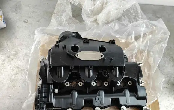 Rocker cam cover