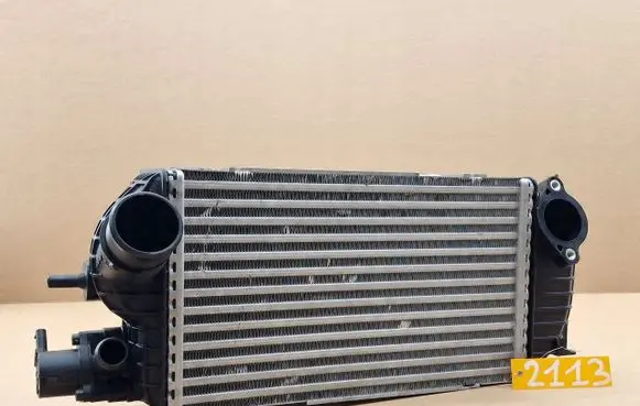Hyundai Tucson JM Intercooler radiator 3408404282702M400