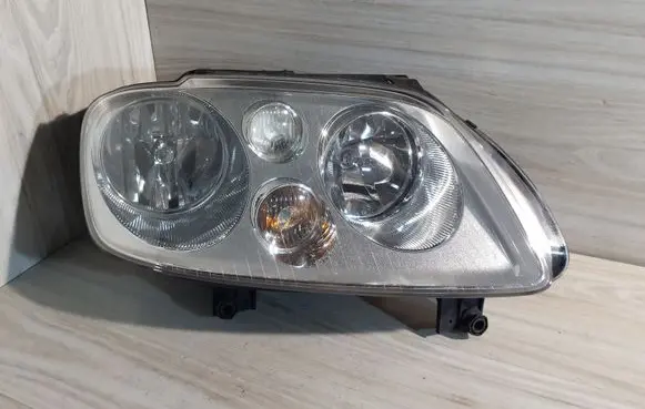 Volkswagen Touran I Headlight/headlamp 0301205202 1T0941006D
