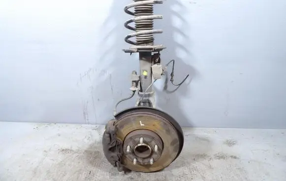 Front shock absorber with coil spring