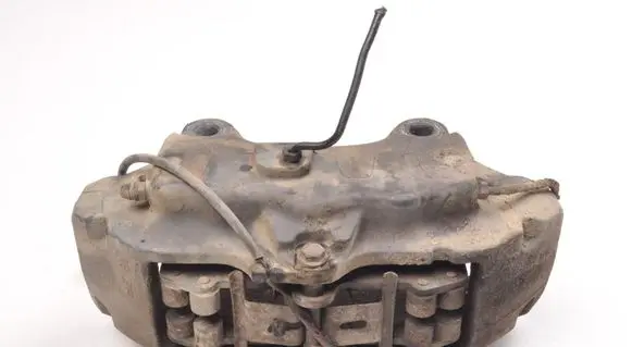 Volkswagen Touareg I Front brake caliper 