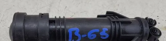 Volkswagen Tiguan Headlight washer spray nozzle 5N0955104A