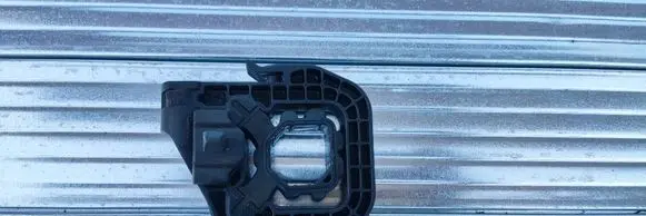 Radiator support slam panel bracket