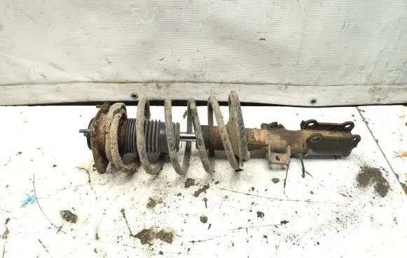 Front shock absorber with coil spring