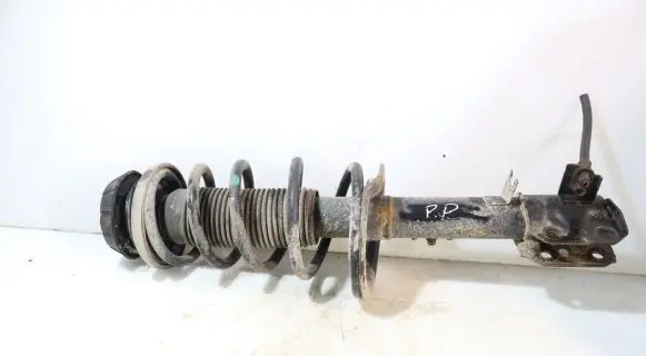 Suzuki SX4 Front shock absorber with coil spring