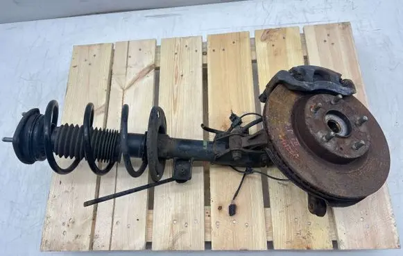 Mazda 3 II Front shock absorber with coil spring