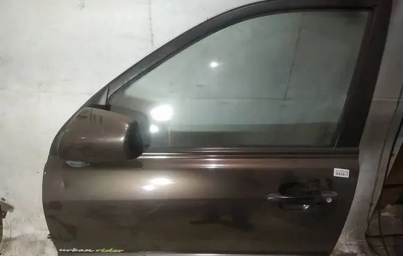 KIA Sportage Front door rudos