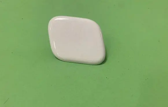 Headlight washer spray nozzle cap/cover