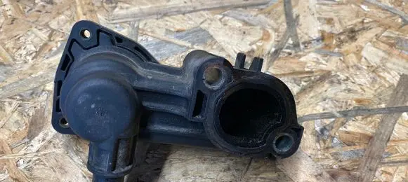 Thermostat/thermostat housing
