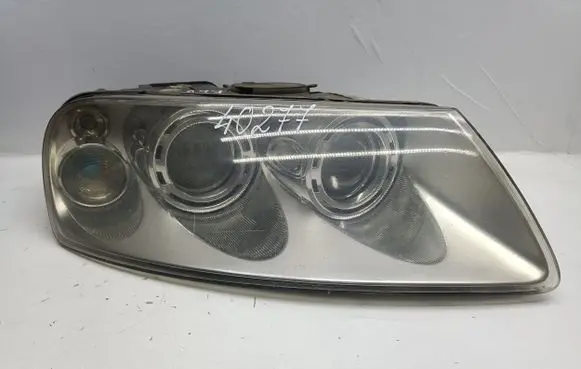 Volkswagen Touareg I Headlight/headlamp 7L6941015BB